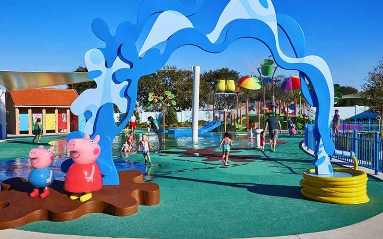 kids in swimsuits playing in water at splashpad at peppa pig theme park legoland florida