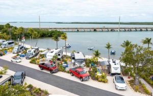 aerial of beach with rv parking and bridge at sugarloaf key key west koa holiday