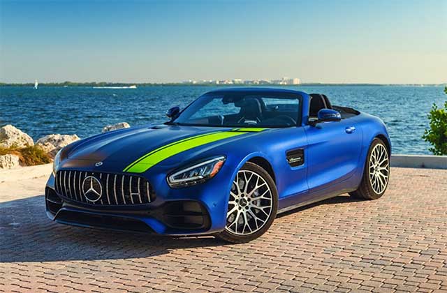 blue and yellow mercedes supercar parked near water inlet coast at blast supercar driving experience