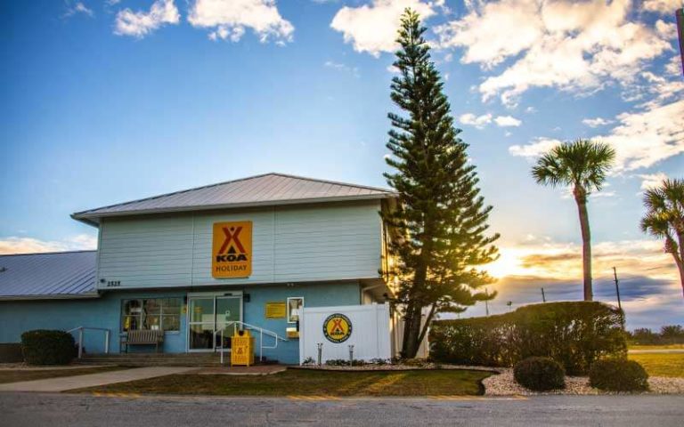 exterior front of office with trees at orlando southwest koa holiday