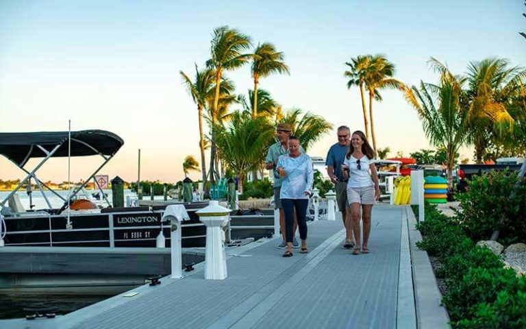 two couples walking along dock in marina area at sugarloaf key key west koa holiday