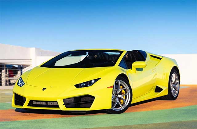 yellow supercar lamborghini on rooftop garage at blast supercar driving experience