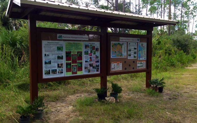 information board outdoor with guide maps and posters at crystal river preserve state park
