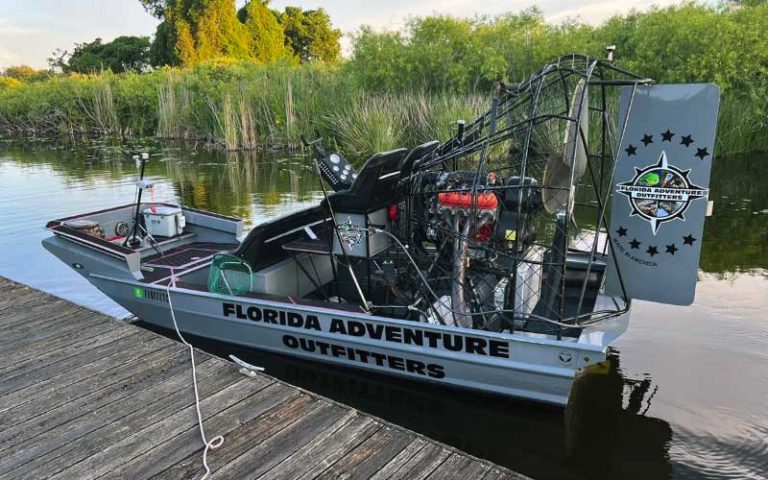 docked airboat on inlet at florida adventure outfitters miami