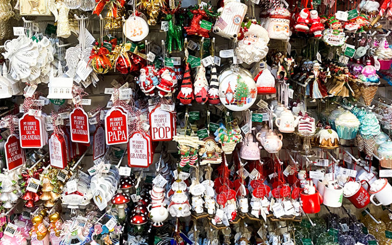 rack of hundreds of christmas ornaments at market street celebration