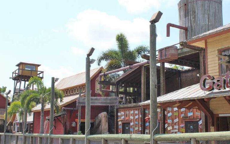 bayou themed buildings and water tower at gator golf adventure park orlando