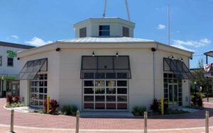 front exterior with lift top doors in plaza at bobbys garage bar in old town