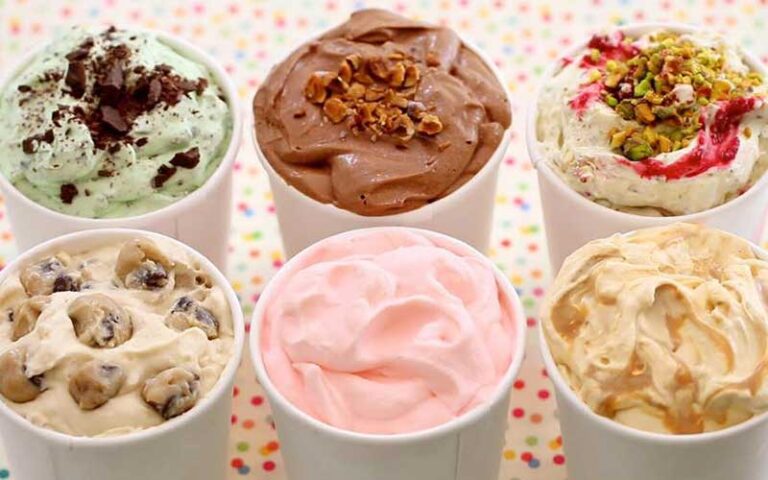six different blended ice cream treats in cups with polka dot background at old town ice cream company