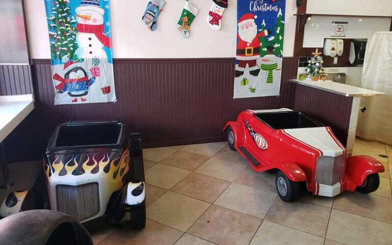 two hot rod play cars in cafe area at sweet dreams cafe old town