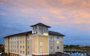 aerial exterior of hotel with dusk sky at hotel indigo jacksonville deerwood park