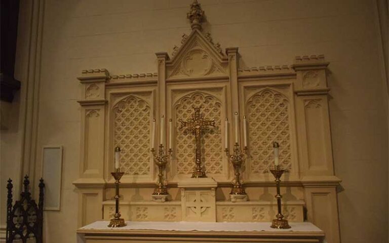altar piece with candlesticks inside church at st johns cathedral jacksonville