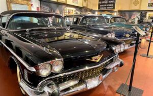 classic black cadillac in a row of cars at dauer classic car museum ft lauderdale