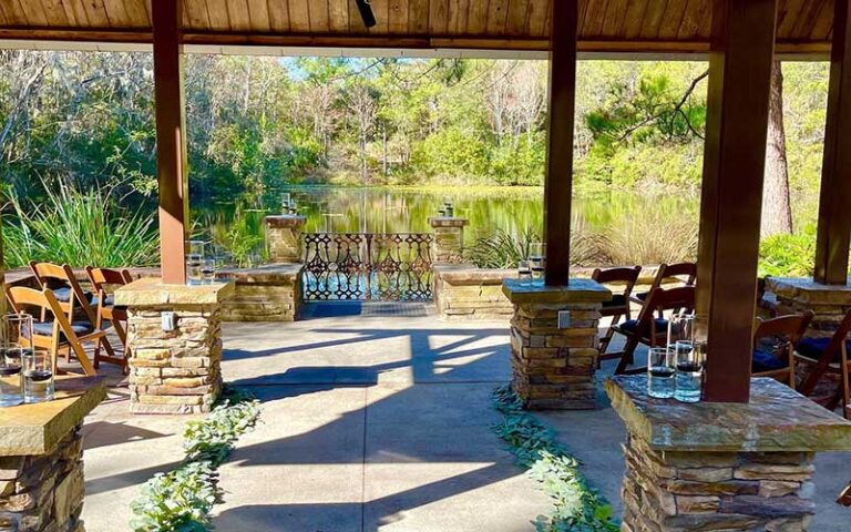 covered event space overlooking pond at jacksonville arboretum botanical gardens