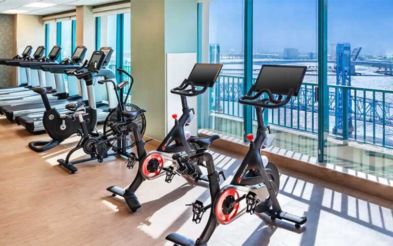 fitness center with cardio facing river view at hyatt regency jacksonville riverfront