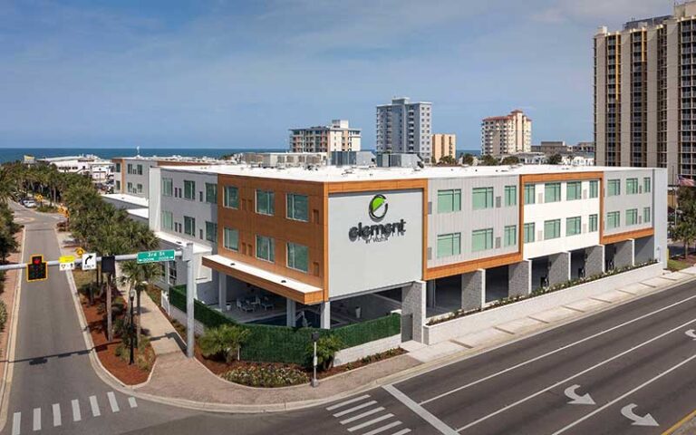 front exterior of hotel with ocean at element jacksonville beach