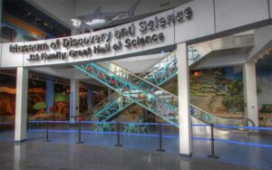 front foyer with escalators and sign at museum of discovery and science ft lauderdale