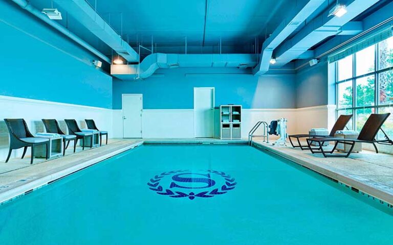 indoor pool area with blue walls and ceiling at sheraton hotel jacksonville