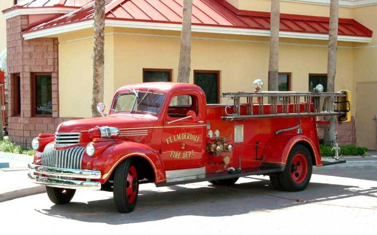 nineteen forties era fire truck in driveway at fort lauderdale fire safety museum