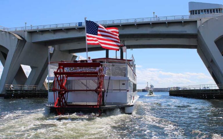 riverboat with paddle wheel going under bridge at carrie b cruises ft lauderdale