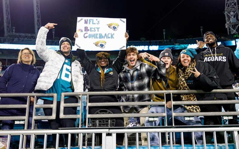 row of jaguars fans in bleachers with comeback sign at tiaa bank field jacksonville