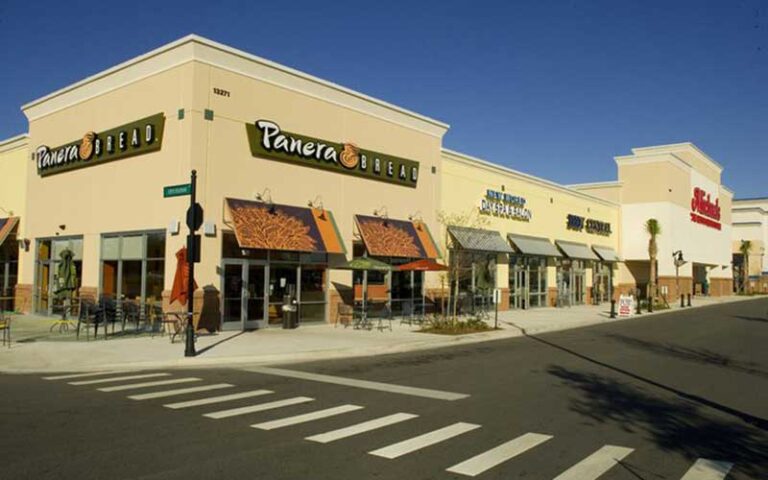 row of storefronts with panera at river city marketplace jacksonville