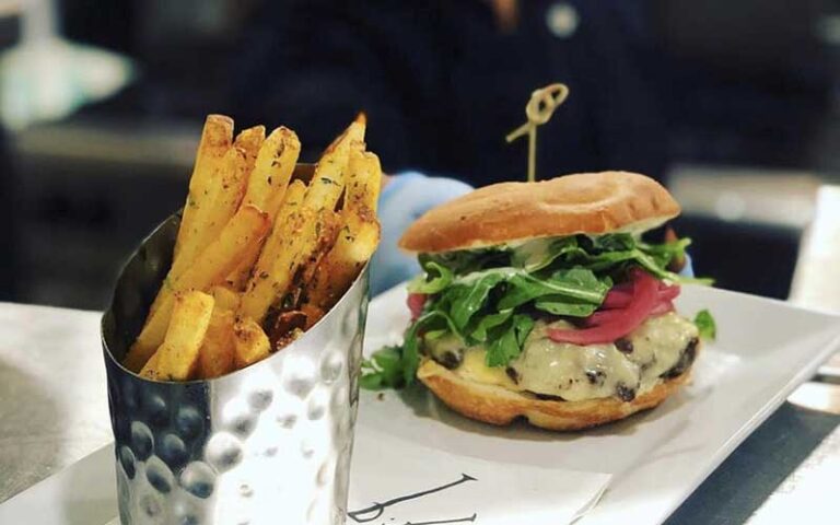 sandwich entree with spinach and fries at bbs restaurant bar jacksonville