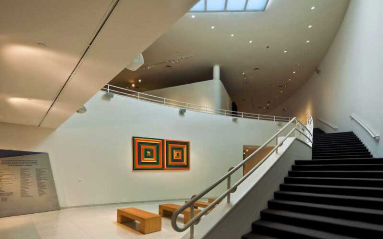 sweeping stairs with art exhibits on landing at nsu art museum ft lauderdale