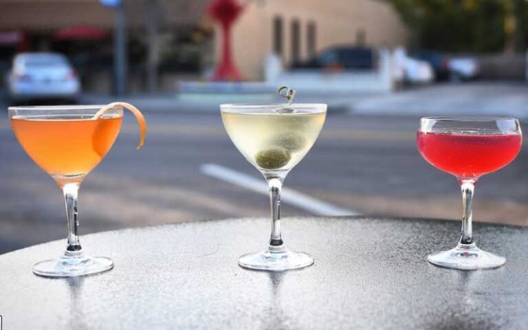 three martini cocktails on outside table at biscottis jacksonville