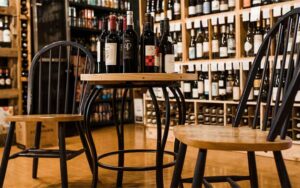 wine tasting table with bottle racks behind at shoppes of avondale jacksonville