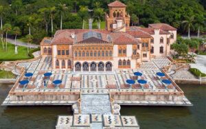 aerial over water of estate mansion with early century details at ca dzan museum sarasota