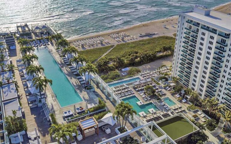 aerial view of hotel with multiple pools and beach at 1 hotel south beach miami