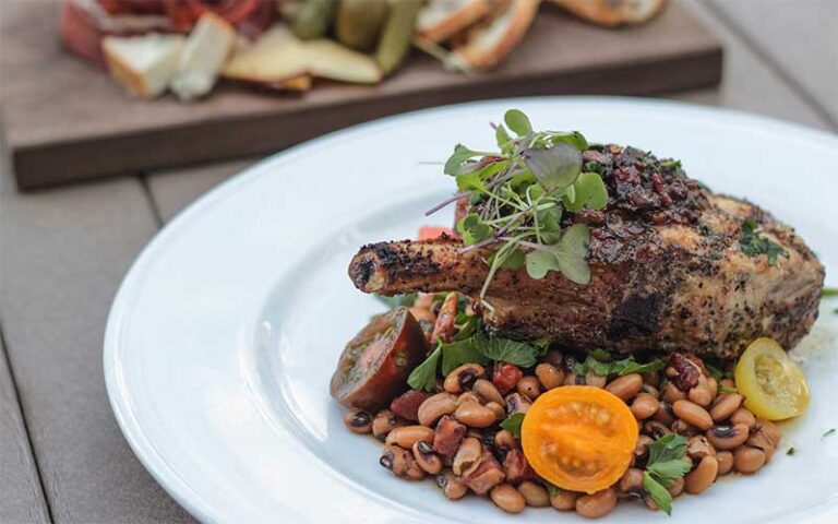 chop dish on white plate with other entree at river post jacksonville