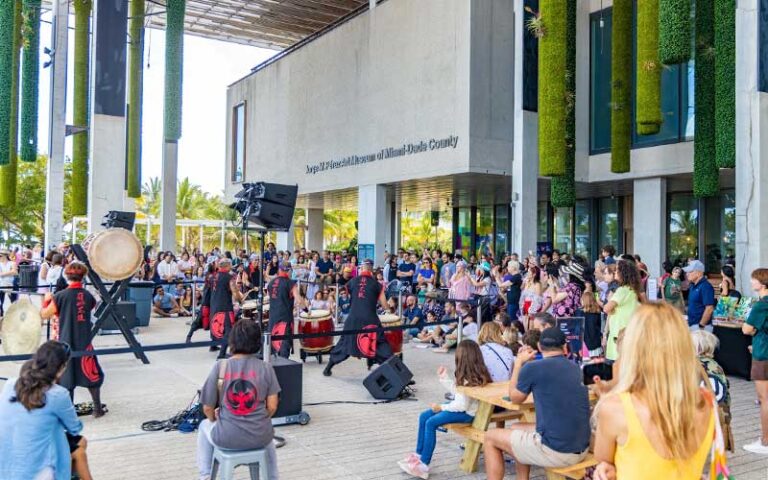 drum performers with crowd on front terrace at perez art museum miami