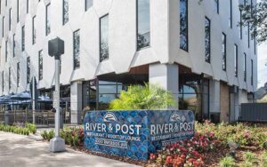 front exterior of building with landscaping and sign at river post jacksonville