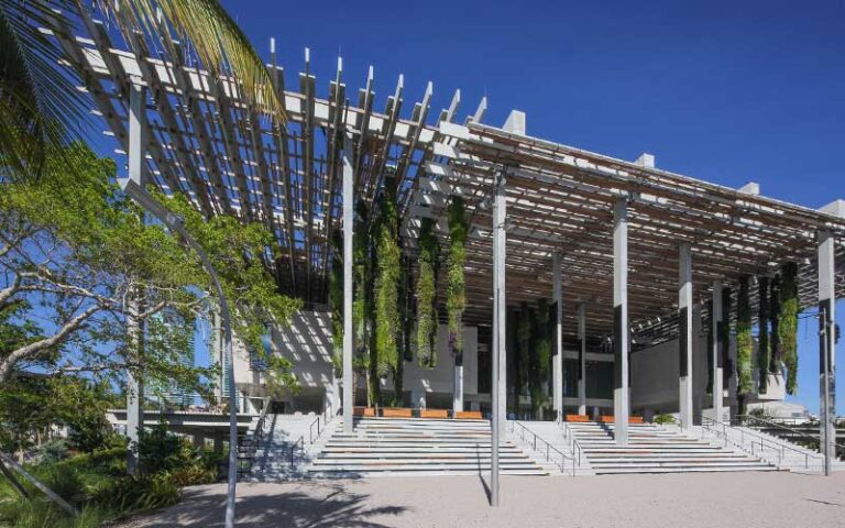 front terrace and steps with lattice and hanging plants at perez art museum miami