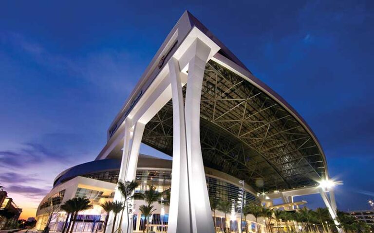 hero shot of stadium at night with roof open at loandepot park miami