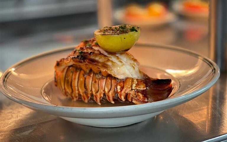 lobster tail entree with lemon at joes stone crab miami