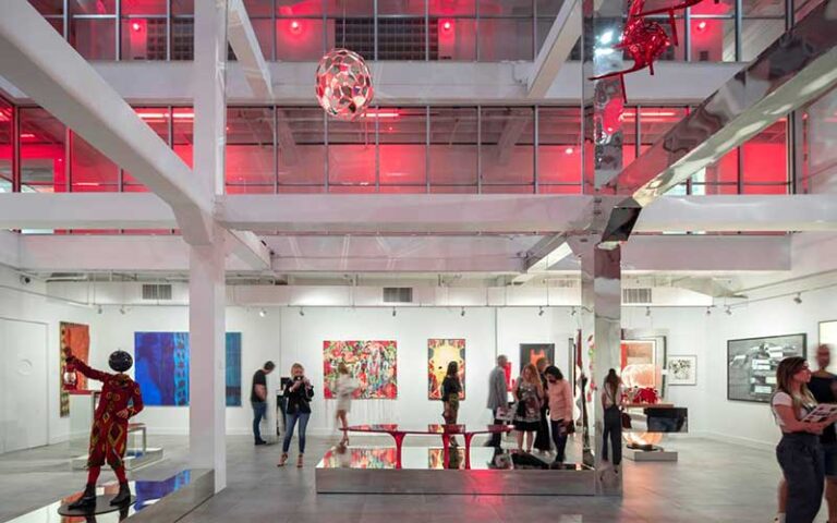 museum exhibit space with viewers atria and artwork at miami design district