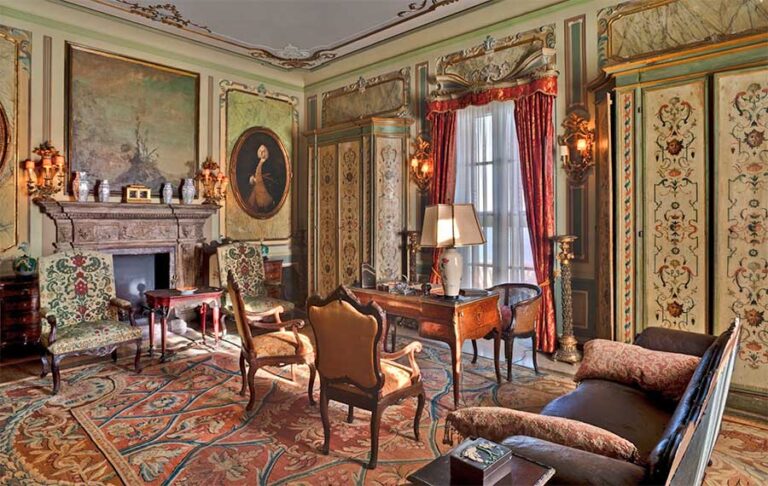 opulent interior of early century mansion with portrait and extravagant decor at vizcaya museum gardens miami