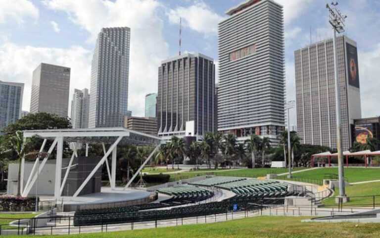 outdoor amphitheater with rows of seats and skyscrapers in background at bayfront park miami