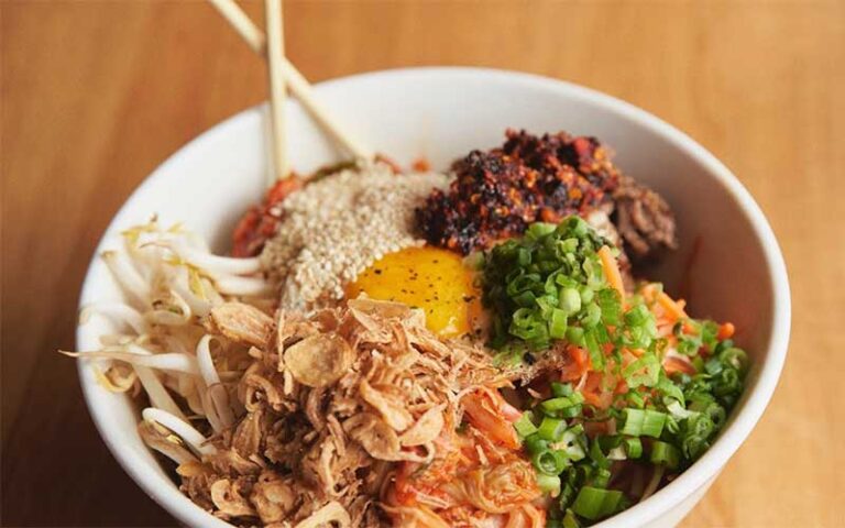 poke bowl with egg kimchi and sprouts at time out market miami