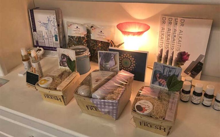 retail shelf display with candle and tea products at wild berry tea spa jacksonville