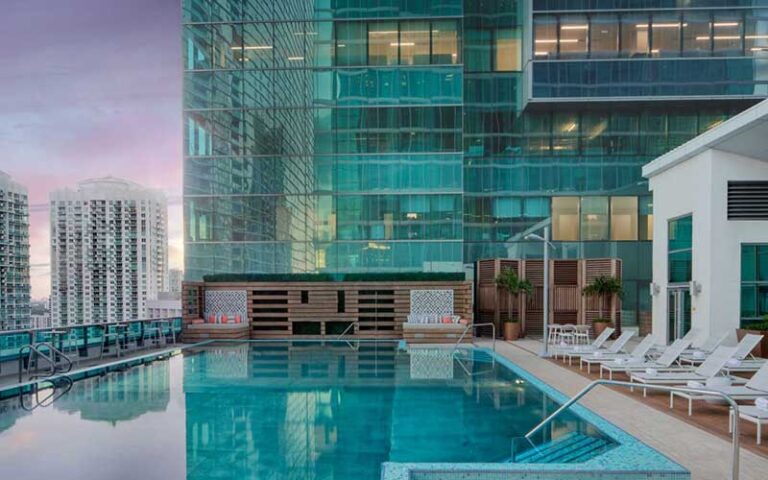 rooftop pool with glass windows at jw marriott marquis miami