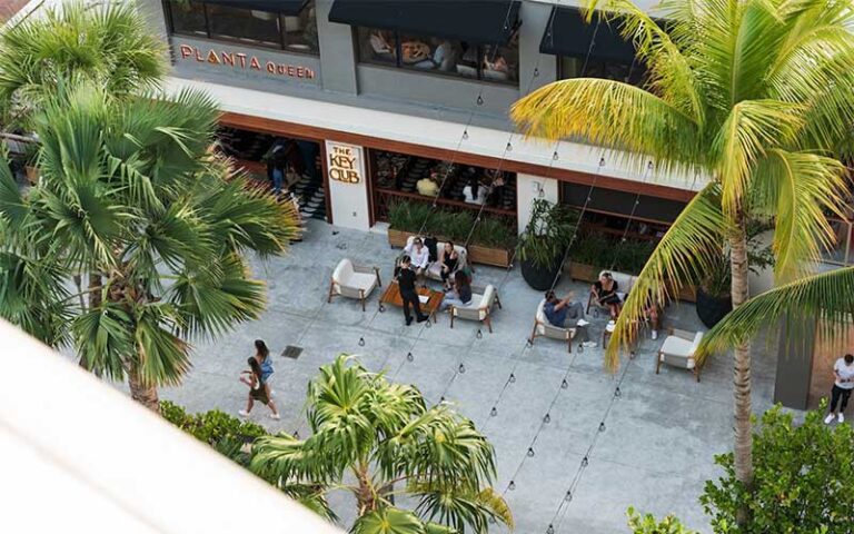 rooftop view of restaurant avenue with shoppers at cocowalk miami
