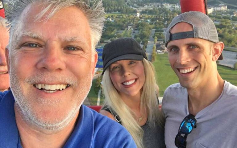 selfie with pilot and customers couple in bucket with aerial view at a hot air balloon ride jacksonville st augustine
