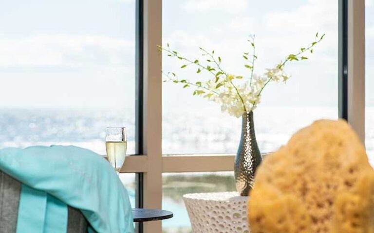 spa lobby with champagne glass sponge art and view at spa at one ocean resort jacksonville