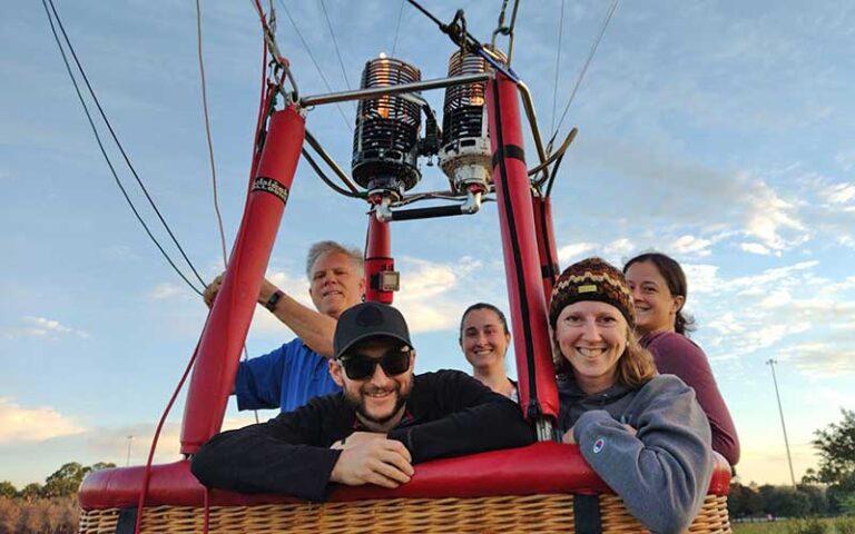 view from ground before lift-off of pilot and customers in bucket at a hot air balloon ride jacksonville st augustine