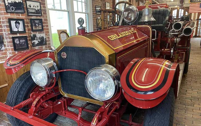 vintage classic fire truck inside exhibit area at orlando fire museum