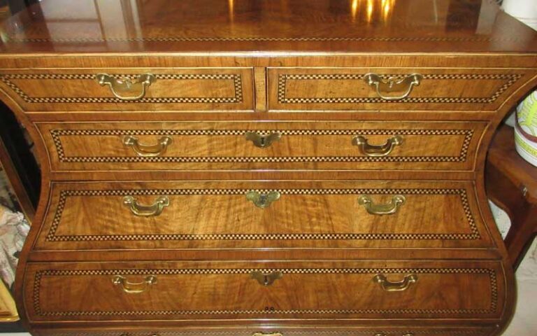 antique dresser with curvy design at sarasota trading company