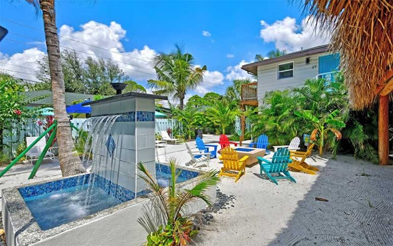 beach patio area with waterfall feature at siesta key palms resort sarasota